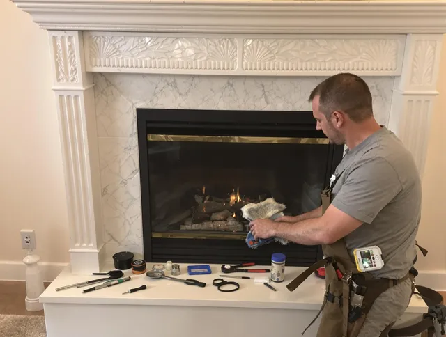 Garden City Chimney Sweep performing fireplace maintenance in Garden City, GA