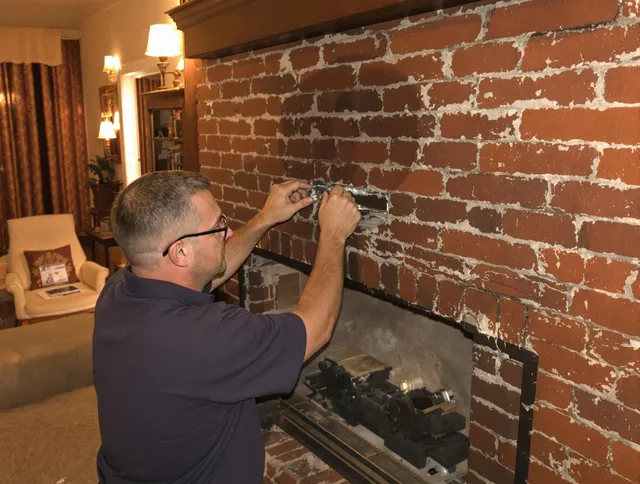 Garden City Chimney Sweep expert fixing a fireplace in Garden City, GA